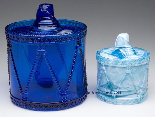 DRUM WITH HAT FINIAL COVERED CONTAINERS, LOT OF TW: DRUM WITH HAT FINIAL COVERED CONTAINERS, LOT OF TWO, turquoise blue slag and sapphire blue, each with polished table ring, unmarked. Attributable to George Davidson, England. Fourth quarter 19th centu