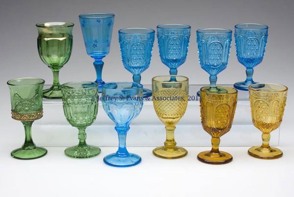VARIOUS EAPG WINES, LOT OF 12: VARIOUS EAPG WINES, LOT OF 12, various colors, including six amber and blue Fine Cut and Panel. Fourth quarter 19th and early 20th century. 3 3/4" to 4 1/2" H. Provenance: From the collection of Pat a