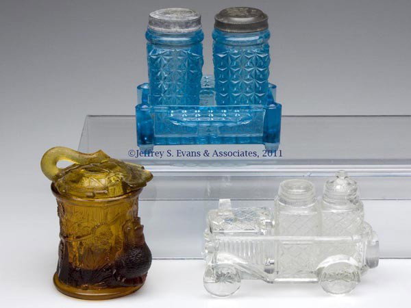 VARIOUS PRESSED GLASS CONDIMENT CONTAINERS, LOT OF: VARIOUS PRESSED GLASS CONDIMENT CONTAINERS, LOT OF THREE, various colors, comprising a Bird and Stump mustard pot with appropriate lid of slightly lighter color, Fine Cut salt and pepper shakers in st