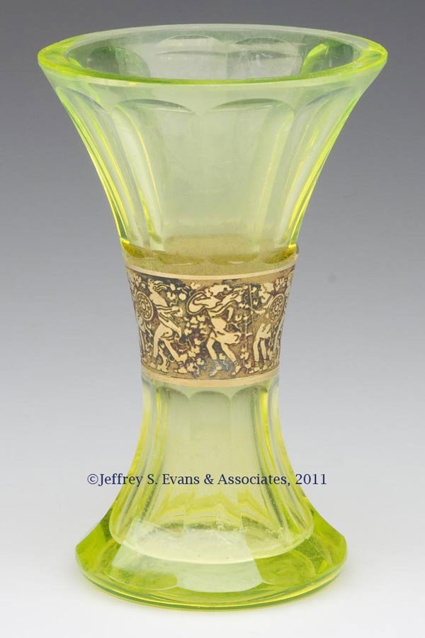MOSER FACET-CUT "SOVEREIGN" VASE: MOSER FACET-CUT "SOVEREIGN" VASE, vaseline, polished pontil mark signed "Moser". 20th century. 5 1/8" H, 2 5/8" D base.