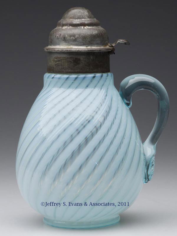 SWIRL - NICKEL PLATE'S NO. 90 SYRUP PITCHER: SWIRL - NICKEL PLATE'S NO. 90 SYRUP PITCHER, blue opalescent, pale blue applied handle with lightly pressed rib pattern to lower terminal, period lid. Nickel Plate Glass Co. Fourth quarter 19th centur