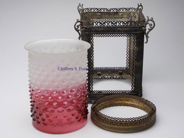 HOBBS' NO. 2384 HOBNAIL / DEWDROP HANGING HALL LAM: HOBBS' NO. 2384 HOBNAIL / DEWDROP HANGING HALL LAMP SHADE, rubina with frosting to colorless, cylinder form with flared fitter, along with an incomplete stamped metal frame and two decorative rings. F