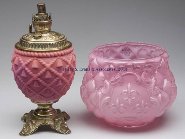 VARIOUS LIGHTING ARTICLES, LOT OF TWO: VARIOUS LIGHTING ARTICLES, LOT OF TWO, comprising a cased pink vase element with fleur-de-lis and scroll pattern; and an opaque pink with satin finish Double Cord and Tassel vase lamp base, metal foot