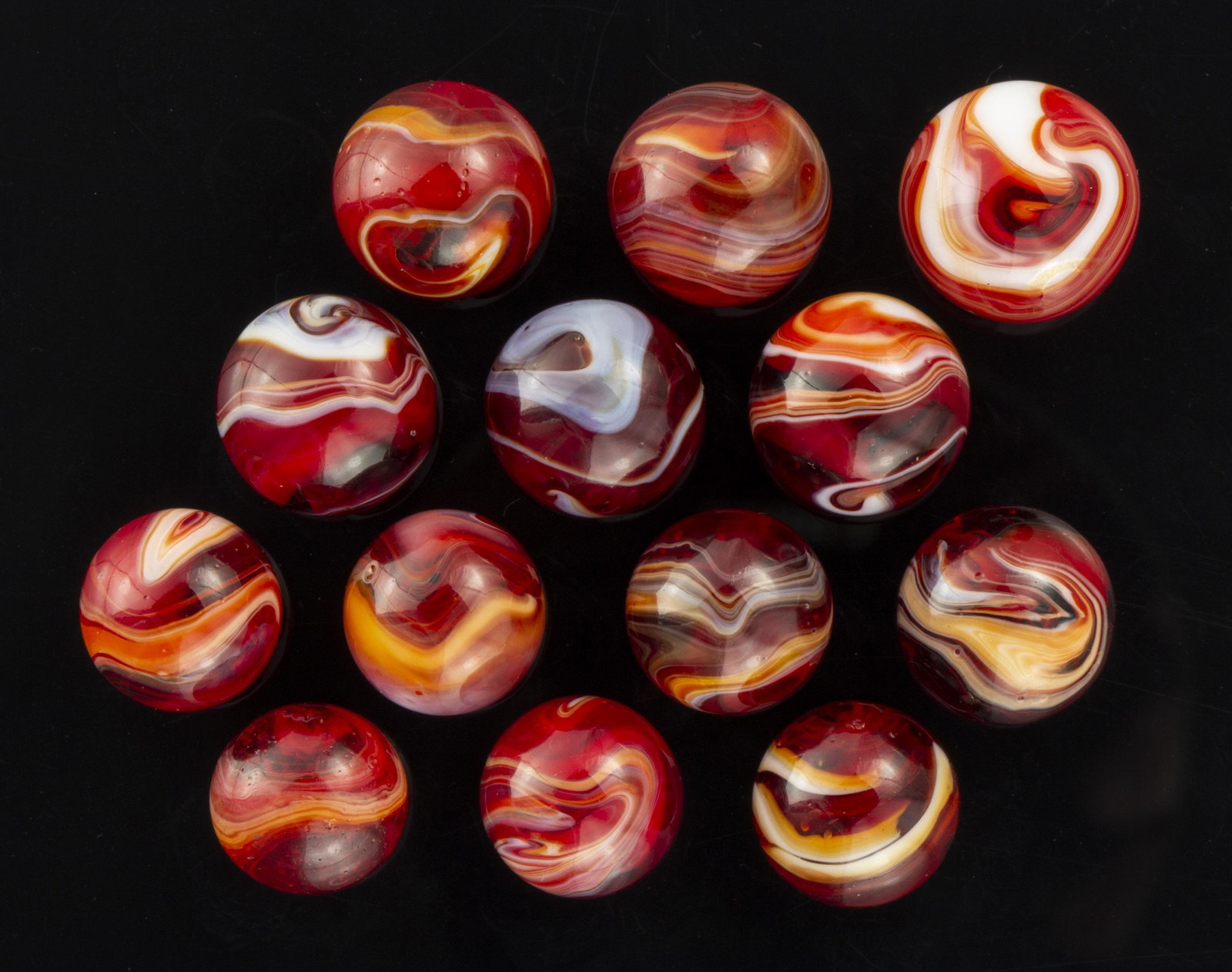 CHRISTENSEN RUBY SLAG MACHINE-MADE MARBLES, LOT OF 13, (1 of 2)