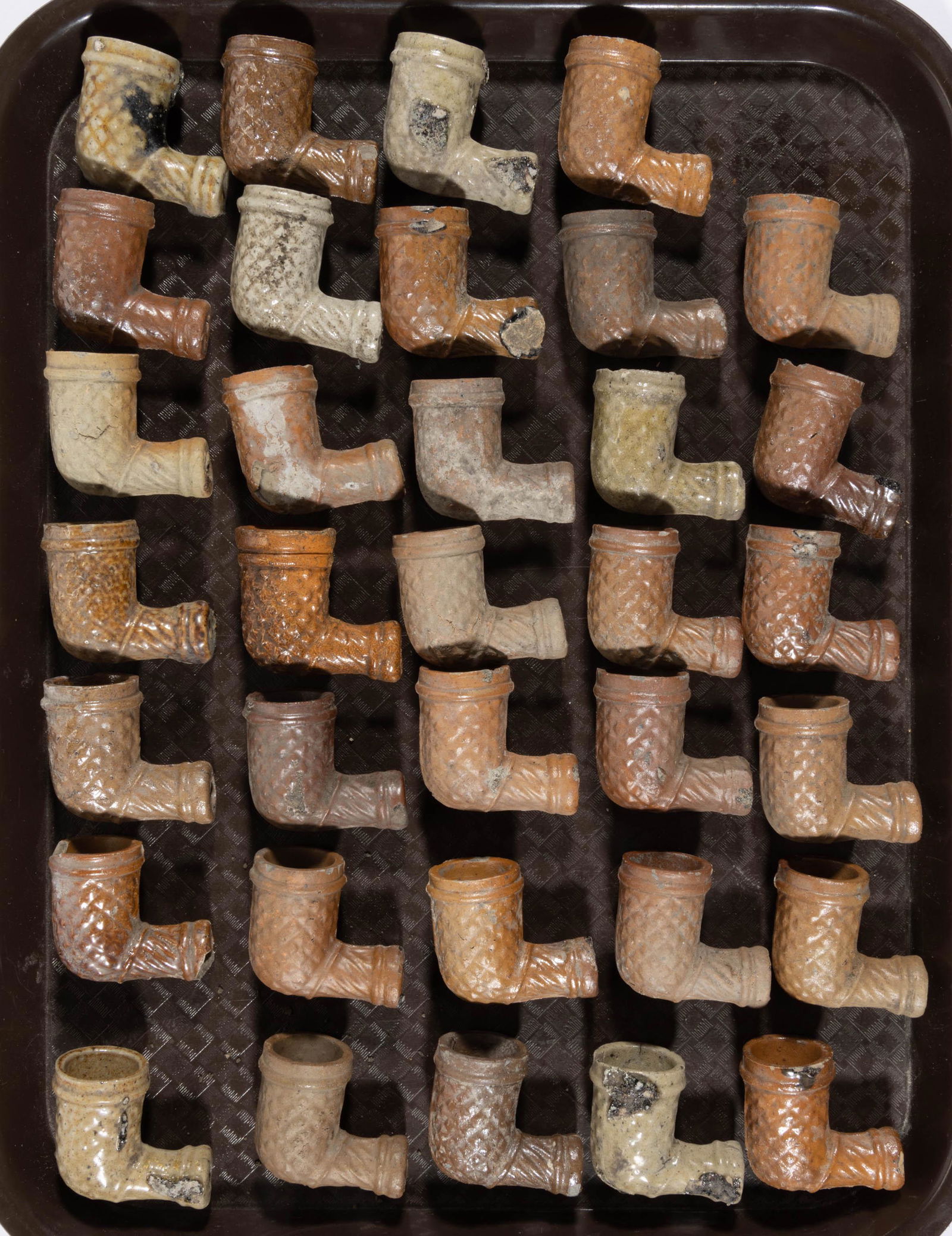 ASSORTED EARTHENWARE AND STONEWARE CLAY TRADE PIPES, LOT OF 34, (1 of 1)