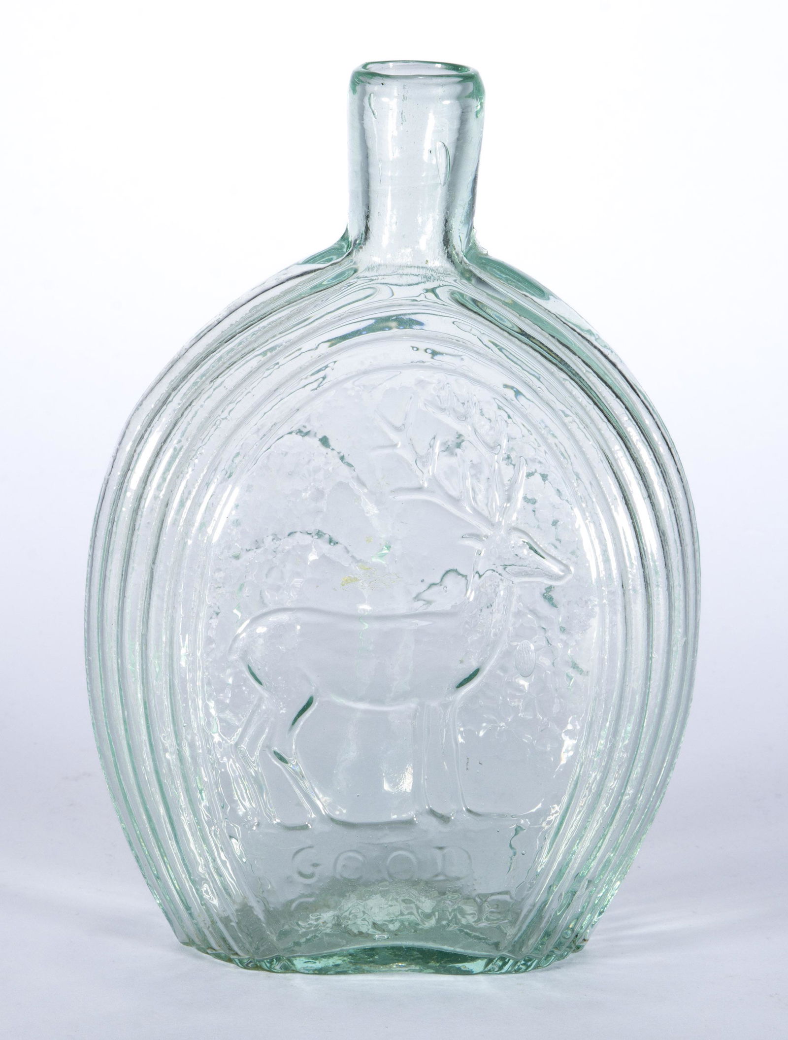 GX-1 STAG - WEEPING WILLOW PICTORIAL FLASK,: light green, pint, obverse embossed "GOOD / GAME", plain mouth, rough pontil mark. Probably Coffin & Hay, Hammonton, N. J. 1840-1860. 7" H.Literature: McKearin/Wilson - American Bottles & Flasks, pp.