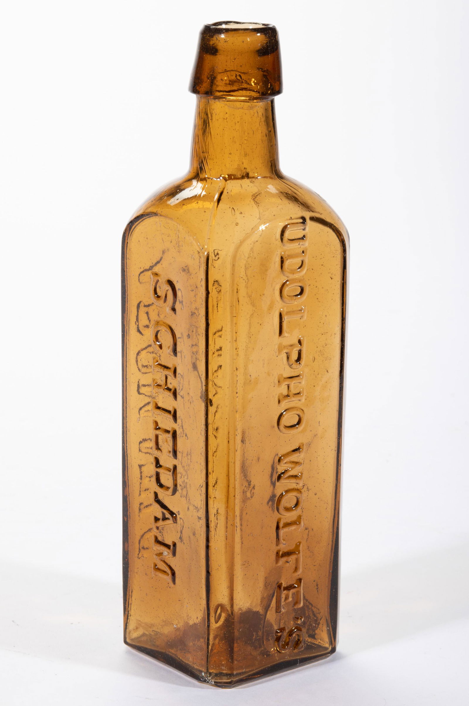 WOLFE'S SCHNAPPS BOTTLE, (1 of 3)