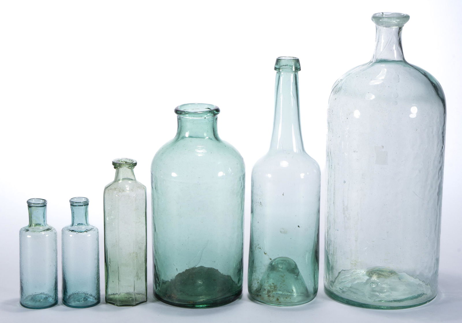 ASSORTED FREE-BLOWN AND BLOWN-MOLDED GLASS BOTTLES, LOT OF SIX, (1 of 4)