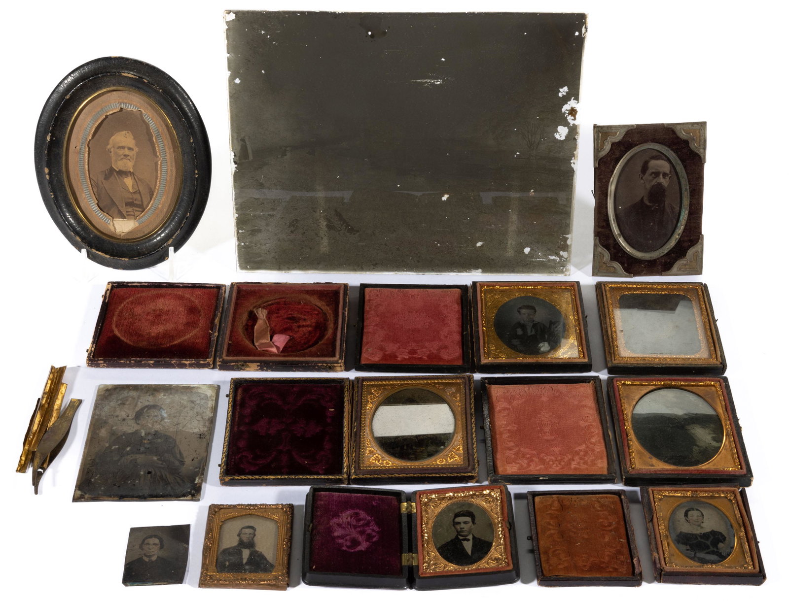 ASSORTED PHOTOGRAPHIC IMAGES, LOT OF TWELVE,: including tintypes, one cased image with locket of hair, thermo-plastic case example, and photographic glass plate. Together with leather case and four frame parts. Fourth quarter 19th century. Variou