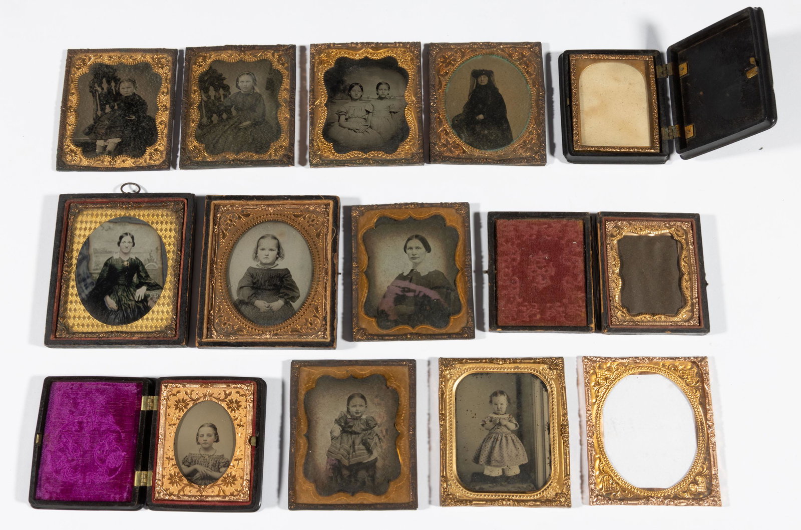 ASSORTED AMERICAN AMBROTYPE AND TINTYPE IMAGES, LOT OF TEN,: including a ninth-plate and nine sixth-plates, including two young sisters and a woman in mourning. One with thermoplastic case, remaining with partial or no case. Together with an empty thermoplastic