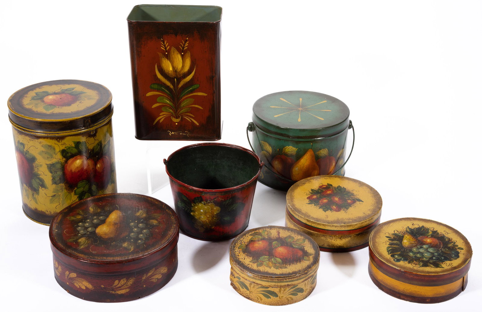PETER OMPIR (AMERICAN, 1904-1979) PAINT-DECORATED FOLK ART TOLEWARE / TREEN ARTICLES, LOT OF EIGHT,: comprising four pantry boxes, coffee canister, two bail-handled pails, and possibly a painted gasoline can, each is signed. Third Quarter 20th century. Canister 8 1/2" H. Provenance: Property from a Y