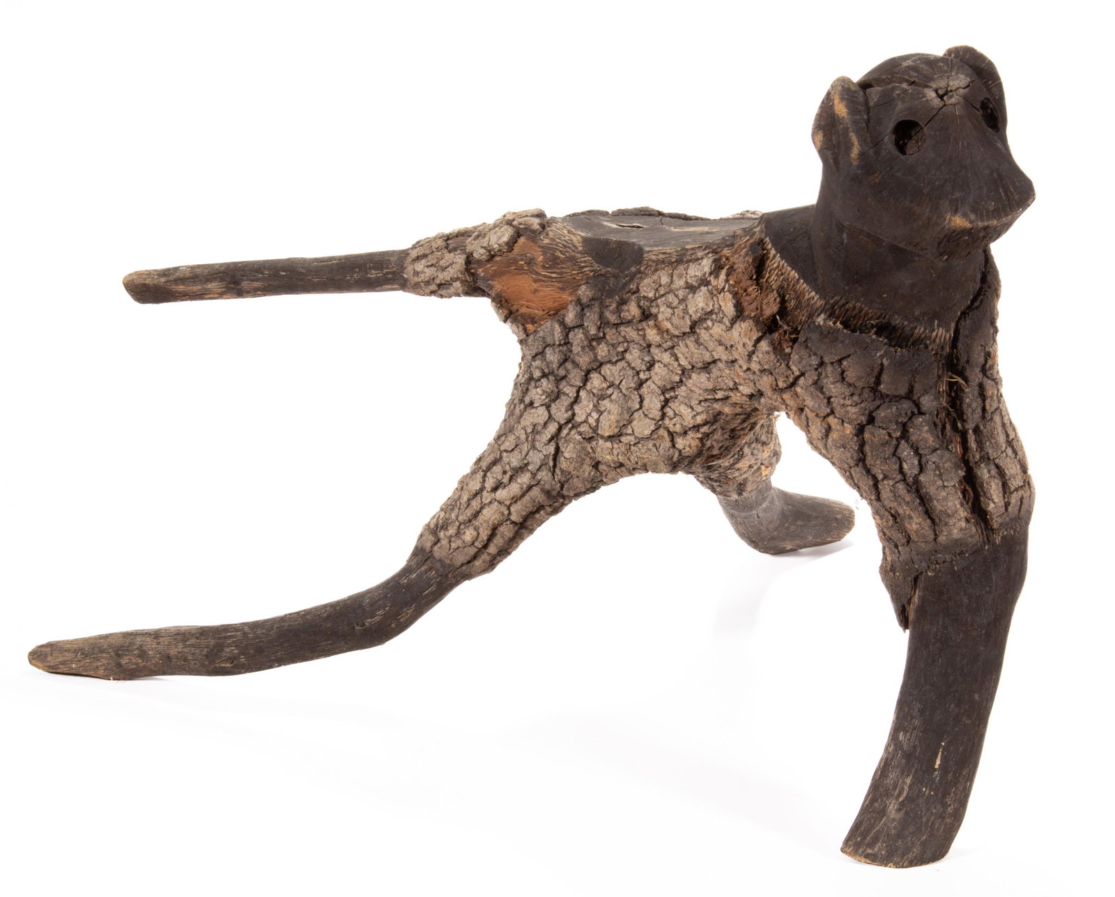 AMERICAN FOLK ART RUSTIC FIGURE OF A CAT,: three-legged form, with carved ears. Retains likely original surface. Second half 20th century. 13" H.