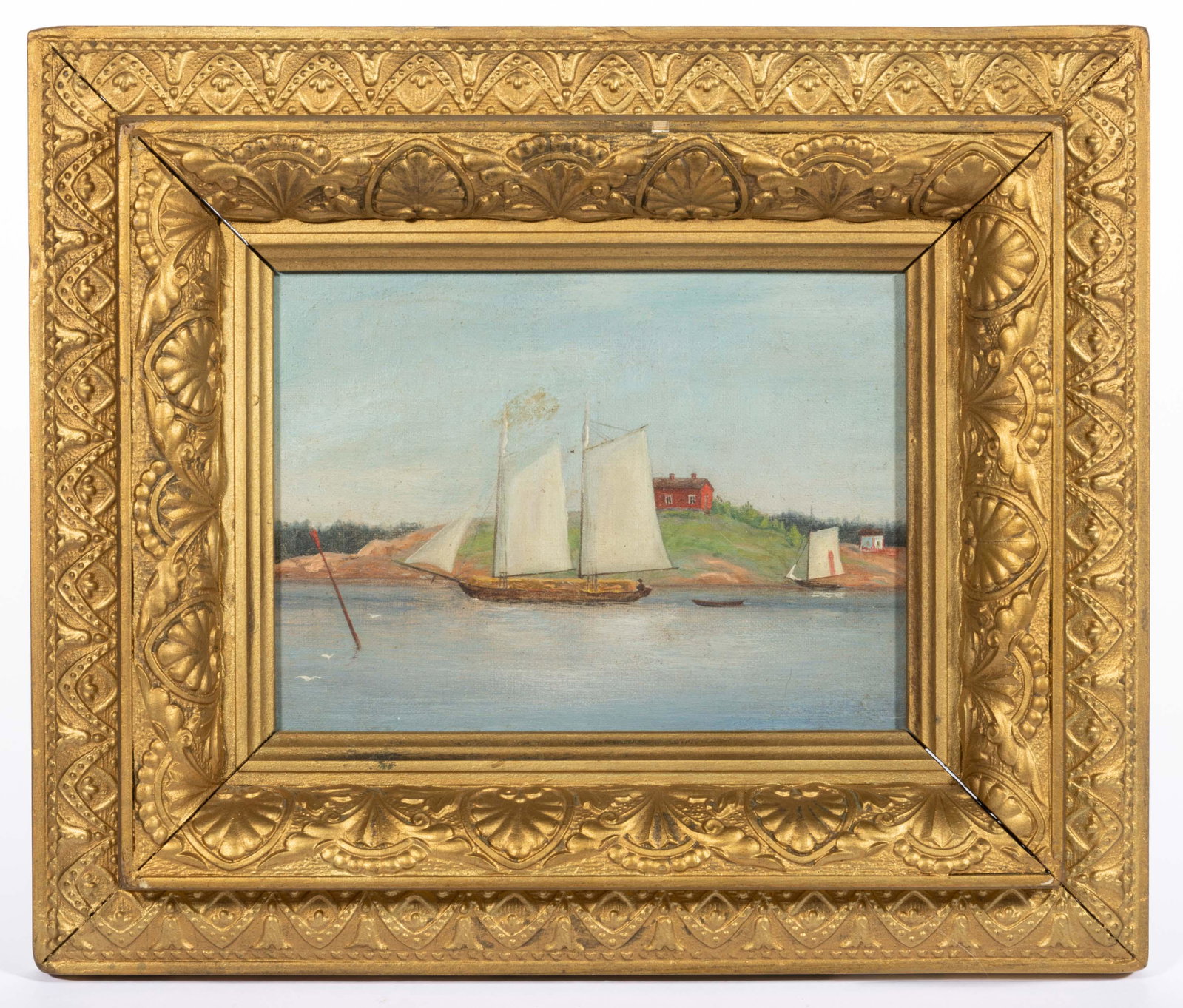 AMERICAN SCHOOL (19TH CENTURY) FOLK ART NAUTICAL PAINTING,: oil on canvas, depicting a two-mast sailing vessel with town along the shore, no signature located. Housed in a gilt molded frame. Second half 19th century. 6" x 7 1/4" sight, 11 1/4" x 13 1/4" OA. Pr