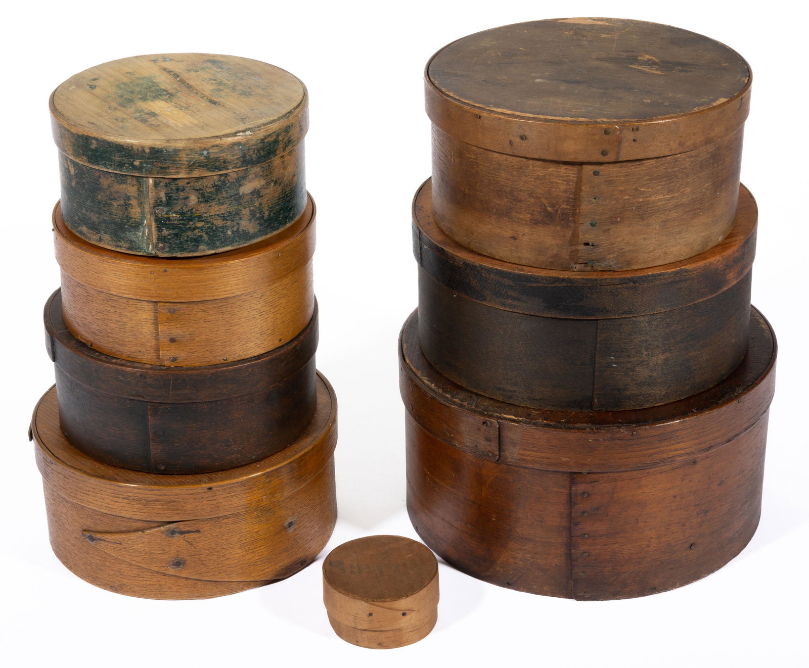 AMERICAN BENTWOOD PANTRY BOXES, LOT OF EIGHT,: including one with illegible stamp on cover, and one example with an old green-painted surface. 19th century. 1 1/2" to 5" H. Provenance: Property from a Youngstown, OH estate.