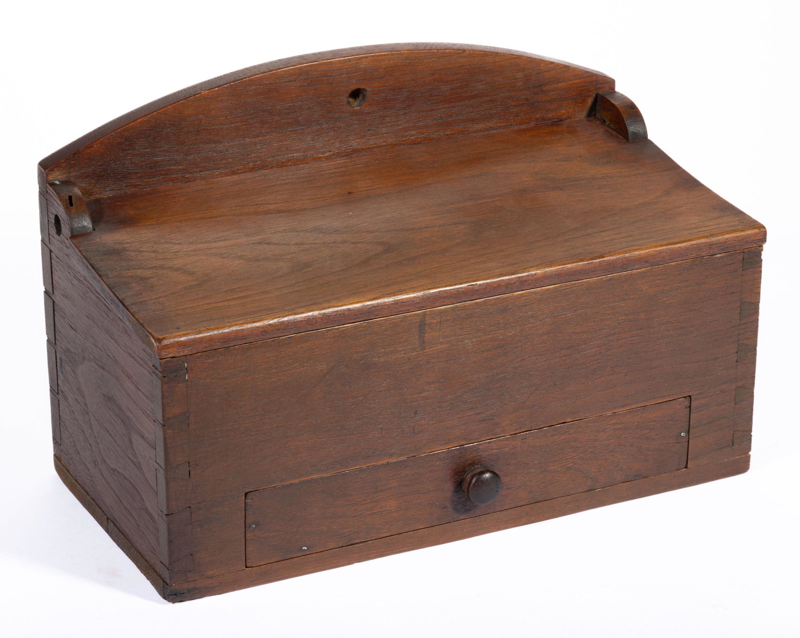SOUTHERN WALNUT HANGING WALL BOX,: dovetailed construction, featuring shaped backboard, hinged lid, and dovetailed drawer at base with later wooden knob. Yellow pine secondary wood. Retains an old surface with warm color. Possibly Virg