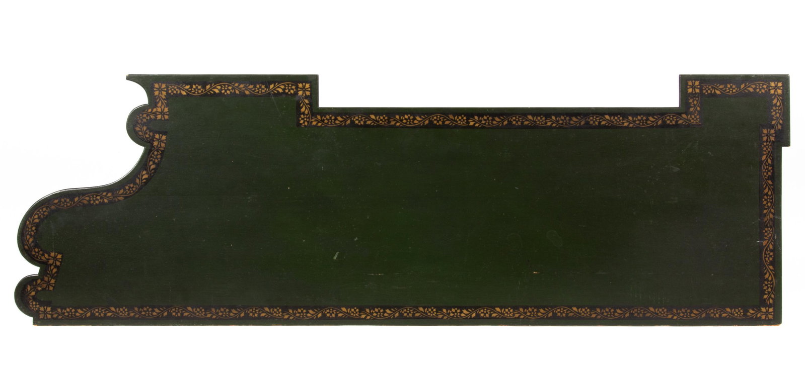 NEW ENGLAND PAINT-DECORATED MAPLE PIANO FORTE DUST COVER,: elongated form with shaped edges. Retains original green-painted surface with a conforming black border having a gilt-stenciled foliate vine decoration, reverse not painted. Circa 1810. 52" x 17" OA. 