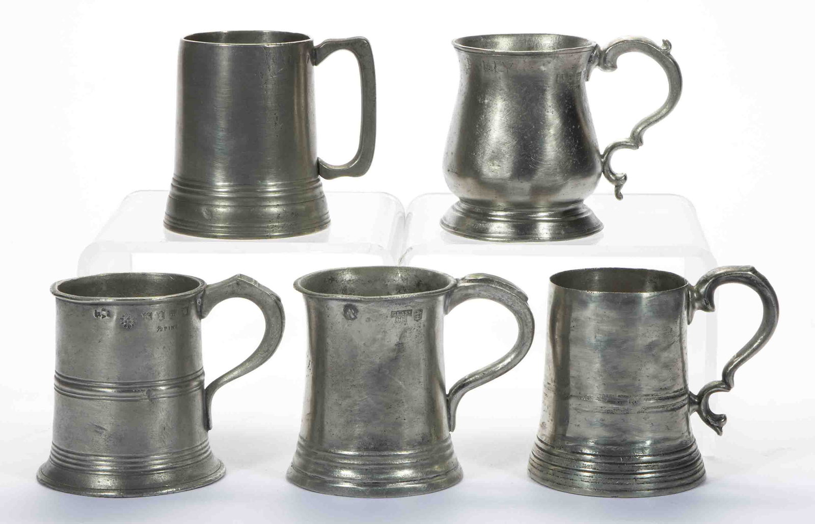 ASSORTED ENGLISH PEWTER MUGS, LOT OF FIVE,: comprising two examples with a colorless bases, including one marked for Townsend and Compton with a rectangular-form handle and a colorless glass base, remaining example unmarked with a colorless pla