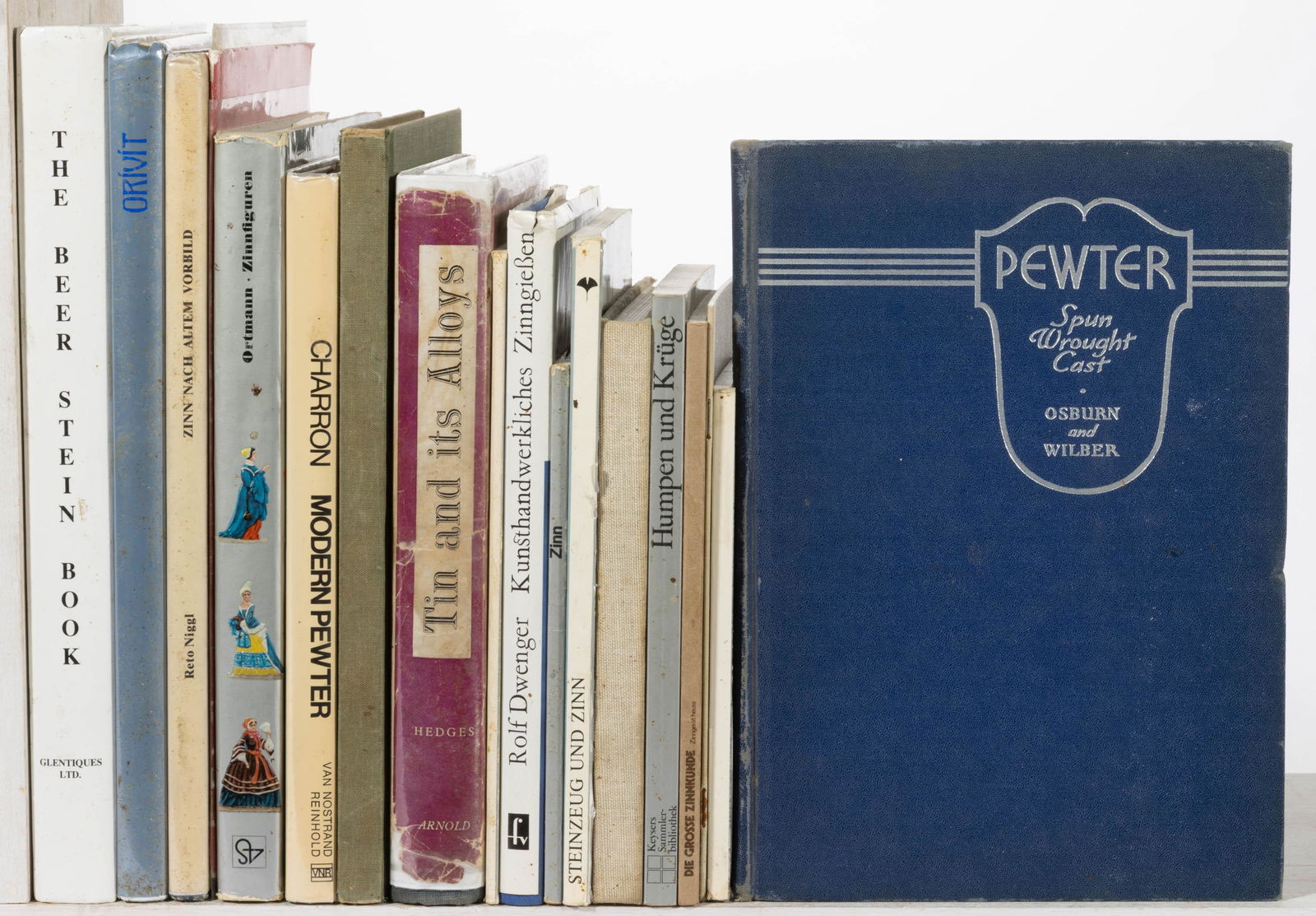 ASSORTED PEWTER AND OTHER RELATED REFERENCE VOLUMES, LOT OF 18,: including Orivit Zinn des Jugendstils aus Koln, Koln: Stadtmuseum, 1992; Kayser, Modern Tafel und Zimmer Decoration, Krefeld: J. P. Kayser Sohn, 1909; 1869 Lion Pilter Pewter, Ghedi: Lion Pilter; Nigg