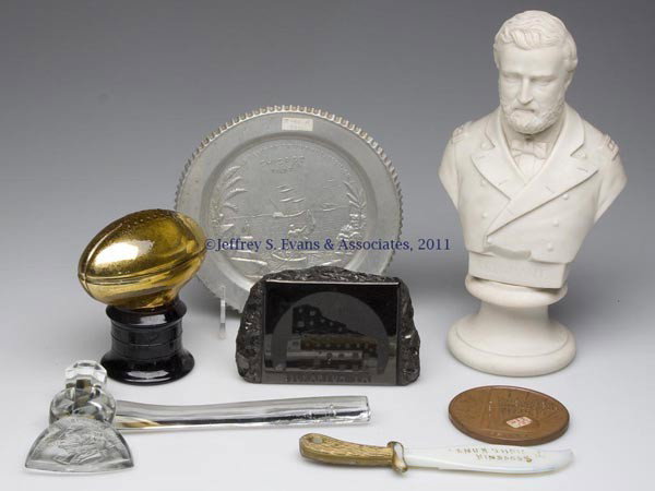 SEVEN ASSORTED HISTORICAL AND SOUVENIR OBJECTS: SEVEN ASSORTED HISTORICAL AND SOUVENIR OBJECTS, including a parian bust of U. S. Grant, 1893 and 1939 World's Fair souvenirs, and a Scranton, PA coal paperweight. 19th and 20th century. Bust 9 1/2" H.