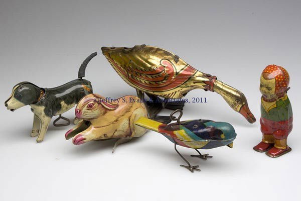 FIVE ASSORTED WIND-UP TIN TOYS: FIVE ASSORTED WIND-UP TIN TOYS, duck marked for Marx and rabbit marked for Chein. First half 20th century. 2 1/2" to 4 1/2" H. Provenance: From the estate of R. Merlin Turner.