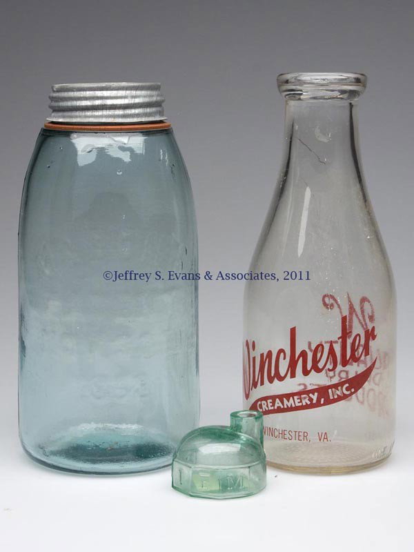 THREE GLASS DOMESTIC ARTICLES: THREE GLASS DOMESTIC ARTICLES, comprising a Winchester, VA Creamery milk bottle, a Mason's 1858 fruit jar with XIII under base, and a "J & I E M" turtle ink bottle. 19th and 20th century. 1 1/2" to 9 