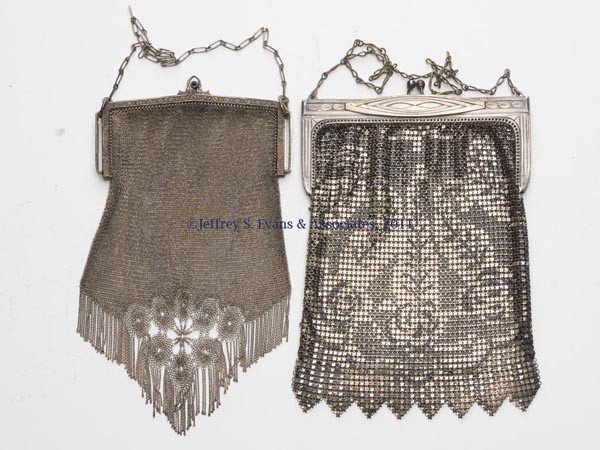 TWO WHITING & DAVIS LADY'S MESH PURSES: TWO WHITING & DAVIS LADY'S MESH PURSES, one with a jeweled clasp and open-work design above the tassels, second with Art Deco black and silver enamel decoration. First half 20th century. 4 1/4" x 8" a