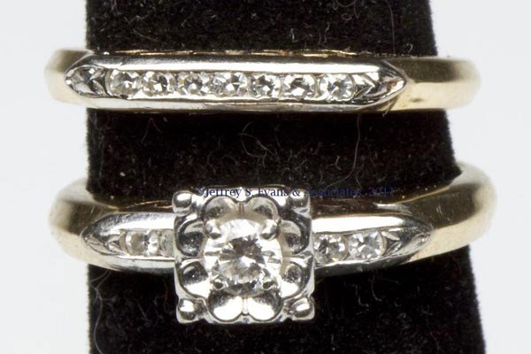 LADY'S DIAMOND AND 14K GOLD WEDDING SET: LADY'S DIAMOND AND 14K GOLD WEDDING SET, comprising an engagement ring set with a small diamond solitaire flanked by diamond chips, and a band set with seven diamond chips. Total weight: 2.7 dwt. 20th
