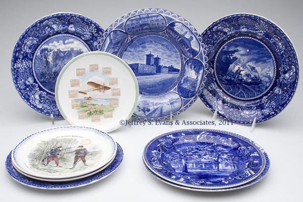 SOUVENIR AND OTHER PLATES, LOT OF NINE: SOUVENIR AND OTHER PLATES, LOT OF NINE, comprising six blue transfer souvenir plates, two French transfer plates from the "Les Grandes Manoeuvres" Series, and a 1912 calendar plate from West Milton, O