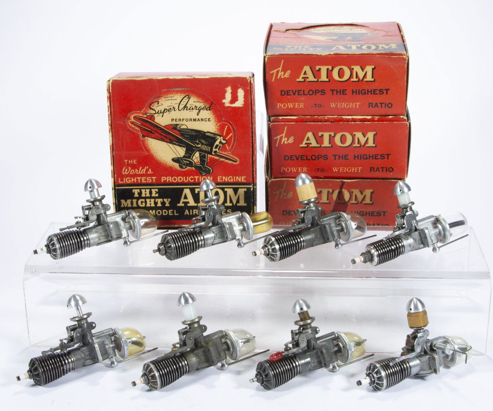 MICRODYNE ENGINES "SUPER ATOM" LATER MODEL AIRPLANE ENGINES, LOT OF EIGHT, (1 of 2)