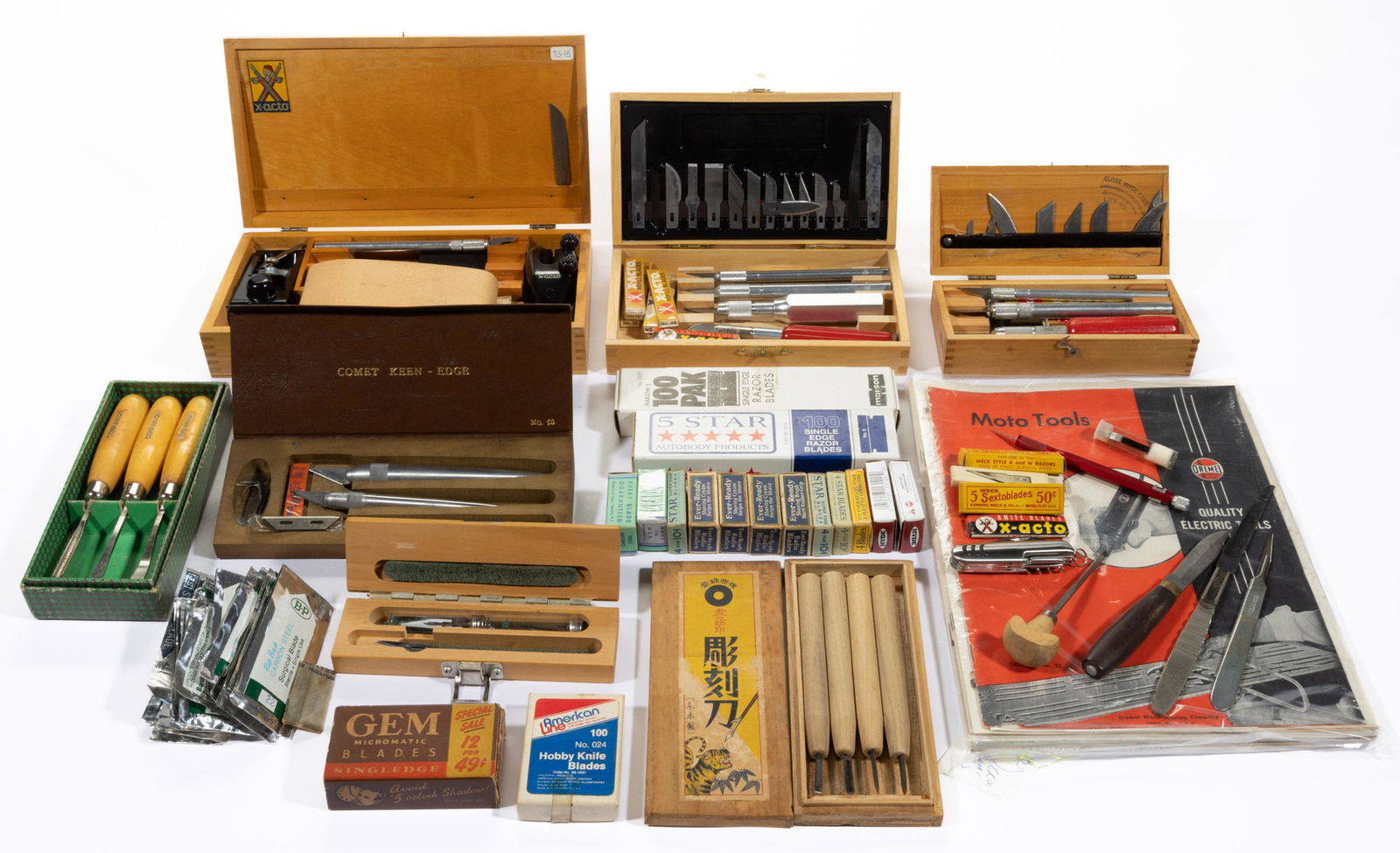 X-ACTO AND OTHER CUTTING TOOLS, UNCOUNTED LOT,: X-ACTO AND OTHER CUTTING TOOLS, UNCOUNTED LOT, including three X-Acto boxed sets including the largest box with a hand plane and a sanding block, various cutting knife and razor blades, a Comet Keen-E