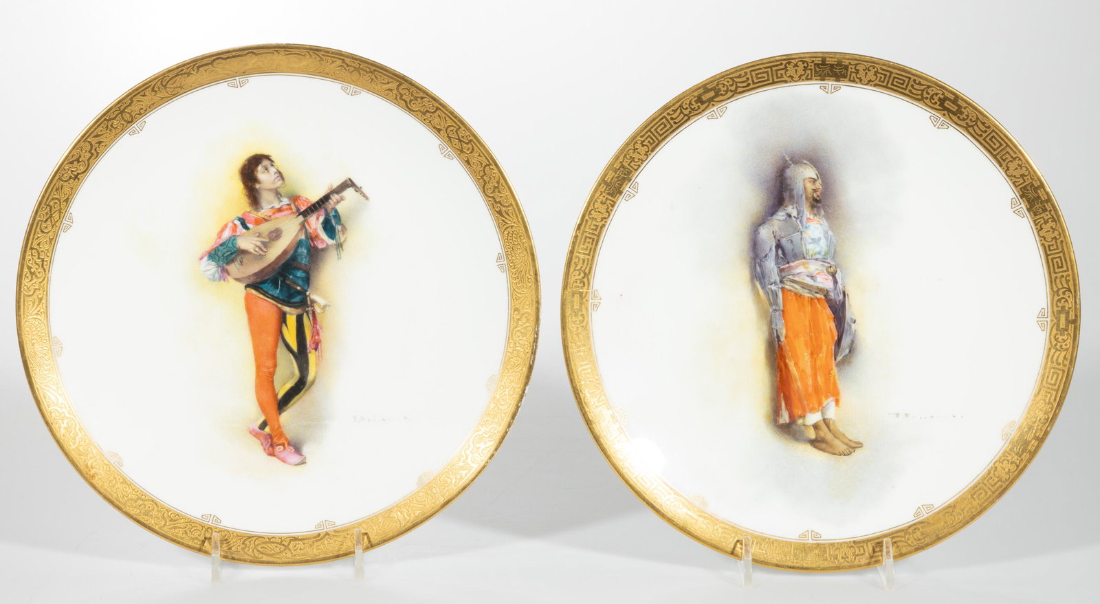 ENGLISH MINTONS PORCELAIN SIGNED "F. BELLANGER" HAND-PAINTED PAIR OF CABINET PLATES,: ENGLISH MINTONS PORCELAIN SIGNED "F. BELLANGER" HAND-PAINTED PAIR OF CABINET PLATES, each polychrome decorated with similar gold encrusted geometric rim decorations, comprising one depicting a jester 