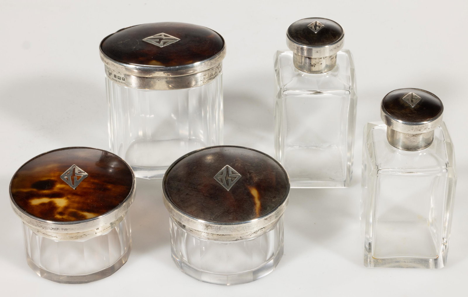 ENGLISH ART DECO STERLING SILVER, SHELL, AND GLASS FIVE-PIECE DRESSER BOX AND BOTTLE SET, (1 of 1)