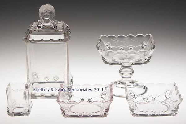 ATLANTA / SQUARE LION ARTICLES, LOT OF FIVE: ATLANTA / SQUARE LION ARTICLES, LOT OF FIVE, colorless, comprising a sugar bowl, jelly compote with engraved decoration, toothpick holder and two berry dishes. Fostoria Glass Co. Fourth quarter 19th c