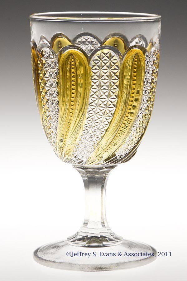 FEATHER - AMBER STAINED GOBLET: FEATHER - AMBER STAINED GOBLET, colorless. Late 19th/early 20th century. 5 3/4" H. Provenance: Personal collection of Judith (Judy) Cronin, Orleans, MA.