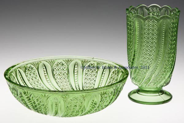 FEATHER BOWL AND CELERY VASE: FEATHER BOWL AND CELERY VASE, lighter green with yellow cast, bowl with plain rim and celery with scallop rim. Late 19th/early 20th century. 8 1/2" D and 6 1/2" H. Provenance: Personal collection of J