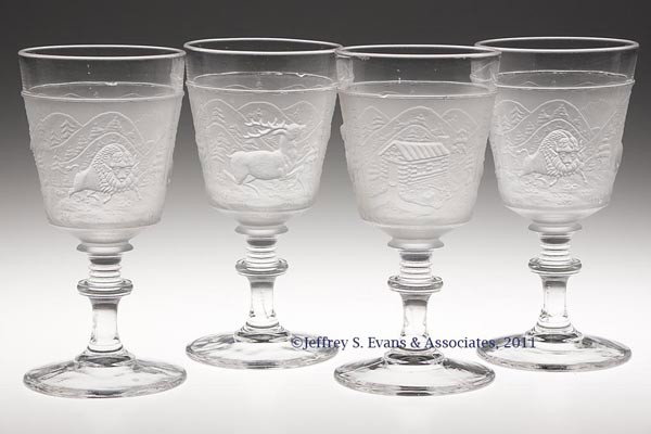 WESTWARD HO GOBLETS, LOT OF FOUR: WESTWARD HO GOBLETS, LOT OF FOUR, colorless and frosted. Gillinder & Sons. Fourth quarter 19th century. 6 3/8" H. Provenance: Personal collection of Judith (Judy) Cronin, Orleans, MA. One: Green Valle