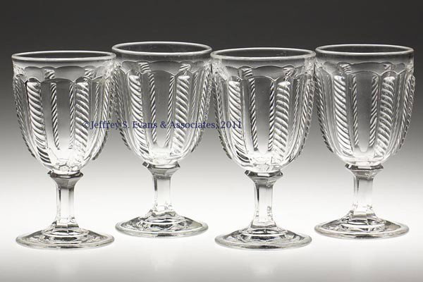 CABLE LARGE GOBLETS, LOT OF FOUR: CABLE LARGE GOBLETS, LOT OF FOUR, colorless lead glass. Boston & Sandwich Glass Co. and others. Third quarter 19th century. 6 3/8" to 6 1/2" H. Provenance: Personal collection of Judith (Judy) Cronin,
