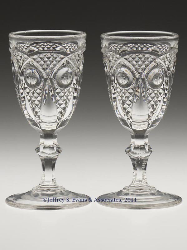 BULL'S EYE WITH DIAMOND POINT / UNION (OMN) WINE G: BULL'S EYE WITH DIAMOND POINT / UNION (OMN) WINE GLASSES, LOT OF TWO, colorless lead glass, each with a knop stem and polished pontil mark. New England Glass Co. Third quarter 19th century. 4 3/8" H. 
