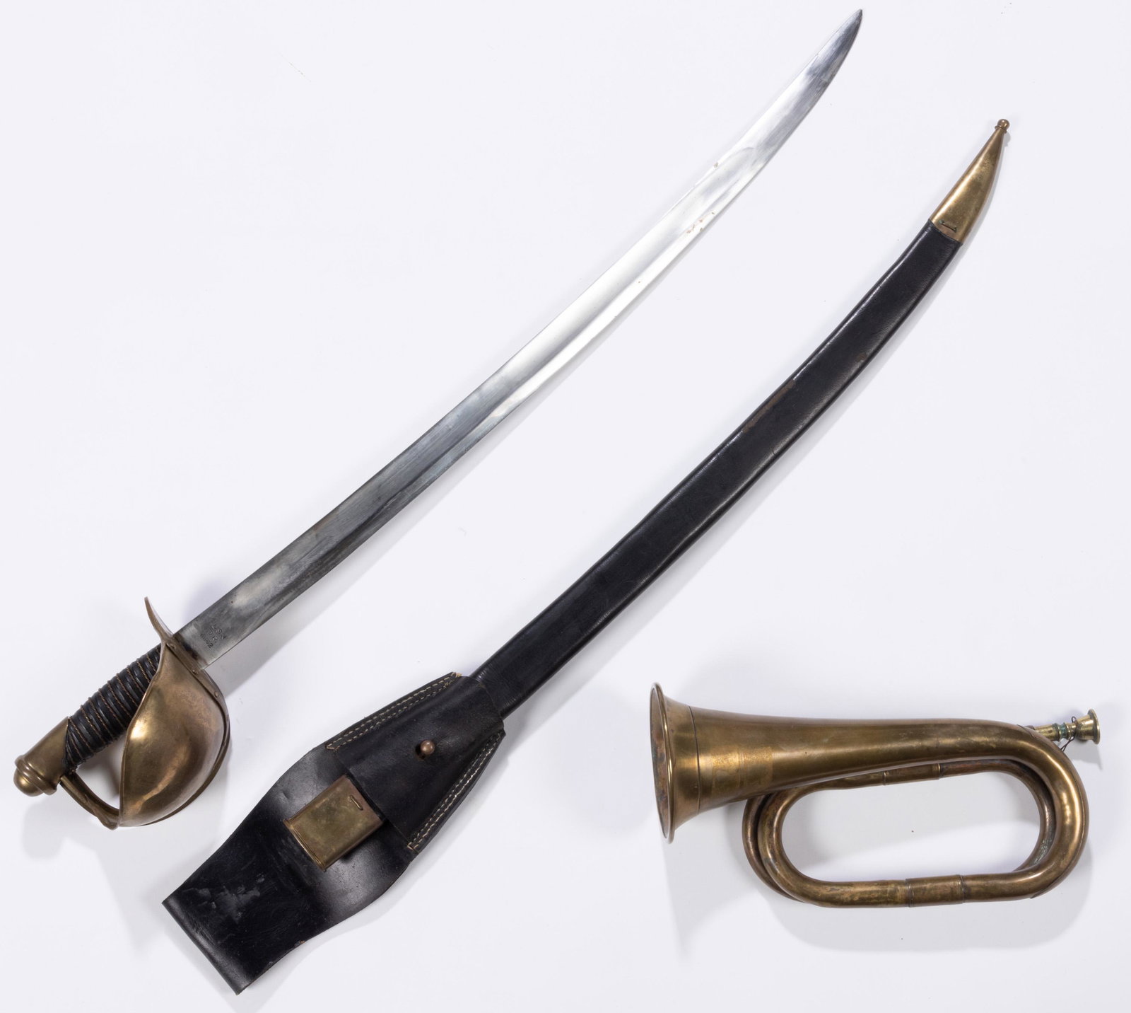 CIVIL WAR RELATED ARTICLES, LOT OF TWO: CIVIL WAR RELATED ARTICLES, LOT OF TWO, comprising a period brass bugle with later CSA inscription, and a replica USN cutlass, marked "USN / DR / 1862", with brass-mounted leather scabbard. Bugle 19th