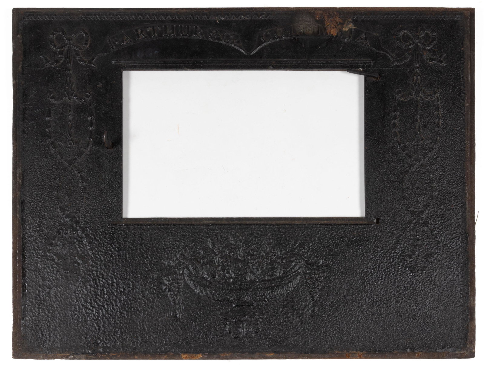 SHENANDOAH VALLEY OF VIRGINIA CAST-IRON STOVE PLATE: SHENANDOAH VALLEY OF VIRGINIA CAST-IRON STOVE PLATE, being a side plate for a ten-plate stove, lettered "I ARTHUR & Co / COLUMBIA" in a banner above the door opening flanked by neoclassical garlands a
