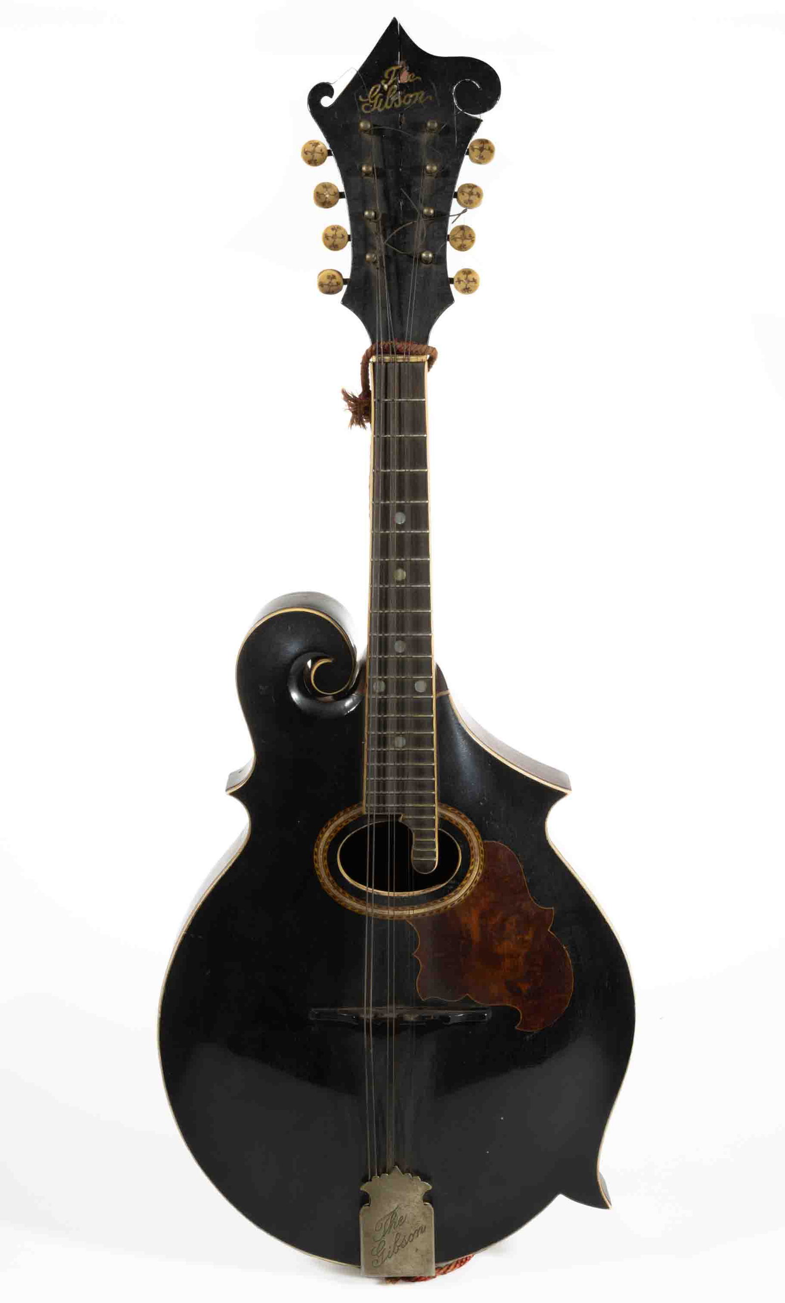 C. 1907 GIBSON F-2 MANDOLIN WITH ORIGINAL CASE: C. 1907 GIBSON F-2 MANDOLIN WITH ORIGINAL CASE, serial number 7413, eight string, three-point asymmetrical body, spruce top with black painted finish, inlaid faux tortoise shell pickguard, and oval so