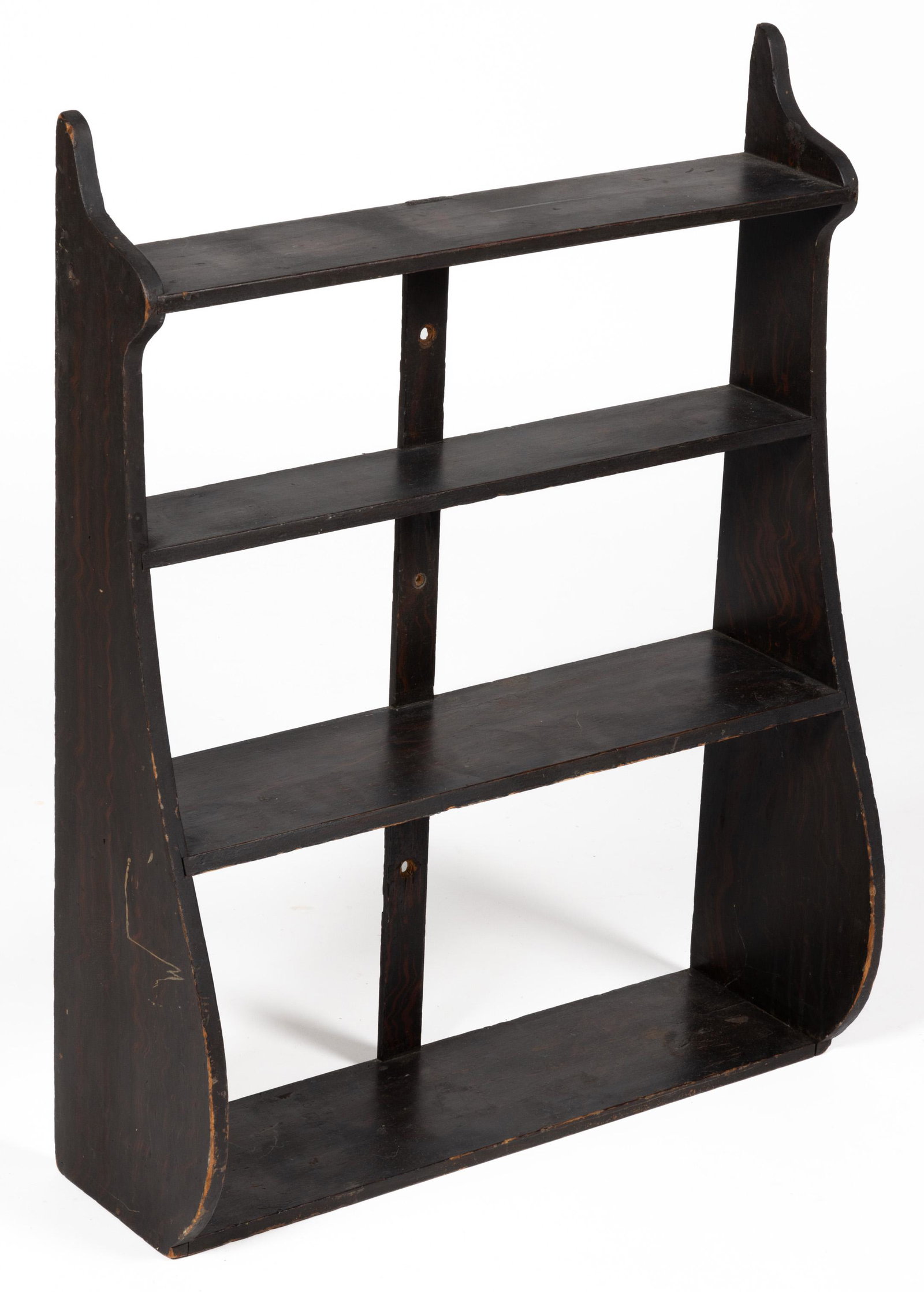 NEW ENGLAND PAINT-DECORATED WALL SHELVES: NEW ENGLAND PAINT-DECORATED WALL SHELVES, "whale's tale" form with shaped sides. Retaining original rosewood-grained painted surface. First quarter 19th century. 32" HOA, 35" WOA. Provenance: From the