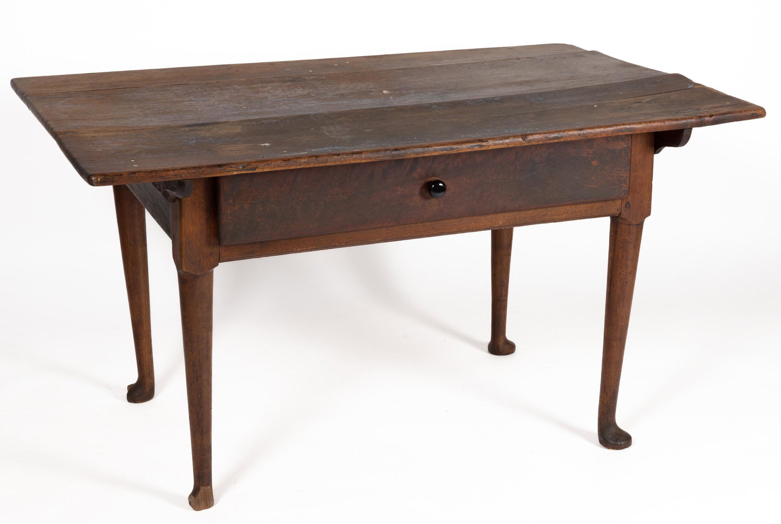 NORTH CAROLINA QUEEN ANNE WALNUT PIN-TOP WORK TABLE: NORTH CAROLINA QUEEN ANNE WALNUT PIN-TOP WORK TABLE, rectangular three-board top shaped battens and generous overhang, above a single lip-molded drawer with divider and later knob, raised on simple ca