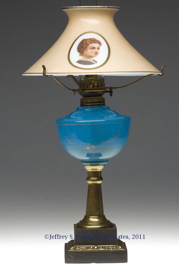UNPATTERNED STAND LAMP: UNPATTERNED STAND LAMP, blue alabaster with traces of gilt decoration, brass stem, double-step slate base with stamped brass ornamentation, No. 1 Taplin-Brown collar. Fitted with a period set-up compr