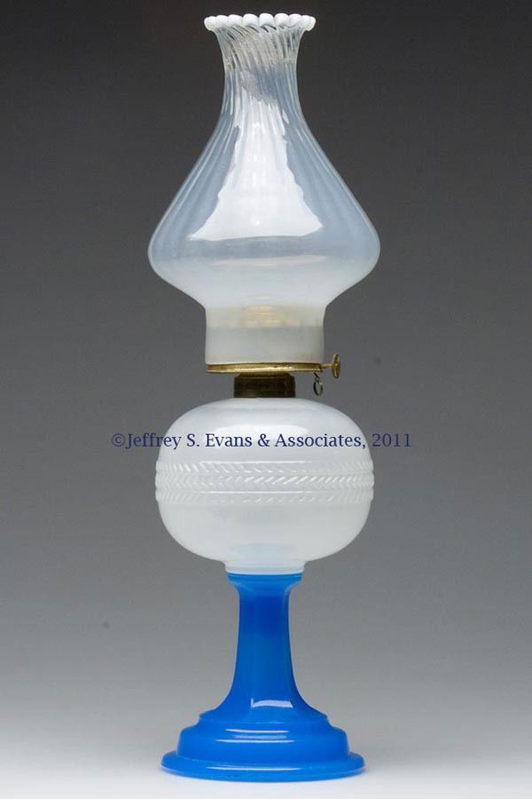 HERRINGBONE BAND STAND LAMP: HERRINGBONE BAND STAND LAMP, alabaster/clambroth font, bright translucent starch blue base, No. 1 brass collar. Fitted with a Wilmot Mfg. Co. No. 1 slip burner, thumbwheel marked "THE WILMOT M'F'G. CO