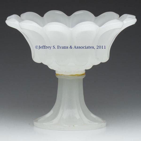 PRESSED LOOP COMPOTE: PRESSED LOOP COMPOTE, alabaster/clambroth, deep bowl with a 12-scallop rim, raised on a six-loop high standard, wafer construction. Boston & Sandwich Glass Co. 1850-1870. 7 5/8" H, 9 1/4" D rim, 5" D