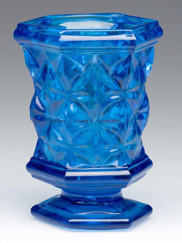 PRESSED SANDWICH STAR SPOON HOLDER / SPILL: PRESSED SANDWICH STAR SPOON HOLDER / SPILL, deep electric blue, hexagonal rim and single-step foot with small rough iron pontil mark. Boston & Sandwich Glass Co. and probably others. Third quarter 19t