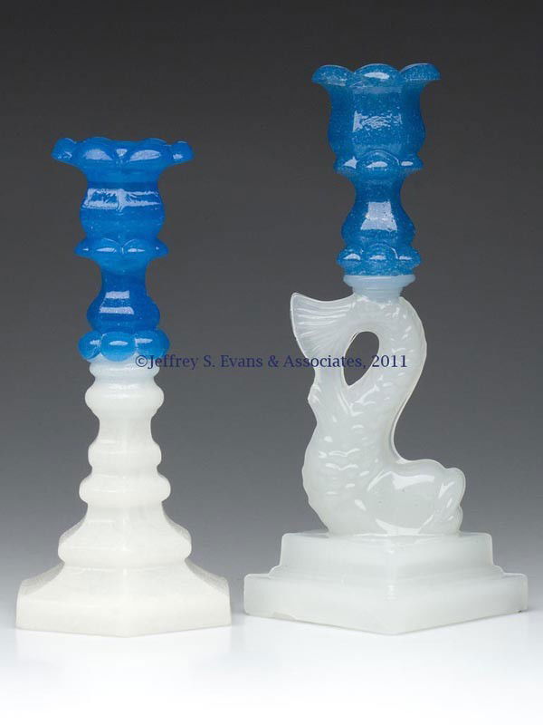 PRESSED PETAL AND HEXAGONAL-BASE CANDLESTICK: PRESSED PETAL AND HEXAGONAL-BASE CANDLESTICK, translucent starch blue over clambroth/alabaster with a lightly sanded surface, reinforced six-petal socket with a hexagonal extension, raised on a double