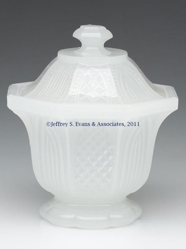 PRESSED LACY GOTHIC ARCH SUGAR BOWL AND COVER: PRESSED LACY GOTHIC ARCH SUGAR BOWL AND COVER, alabaster/clambroth, octagonal bowl with two different arch designs and a plain rim, raised on an eight-petal foot, fitted with a similar, darker color c