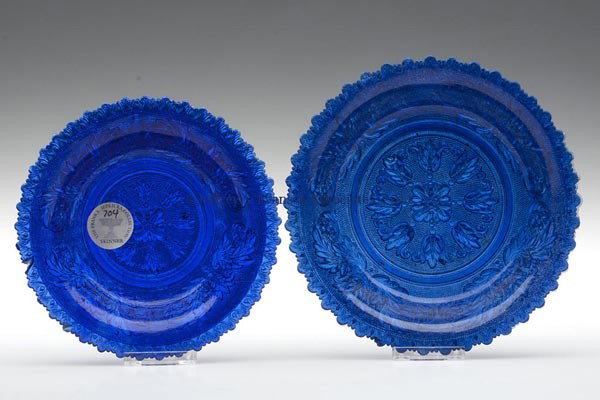 TWO PRESSED LACY TULIP AND ACANTHUS LEAF NAPPIES: TWO PRESSED LACY TULIP AND ACANTHUS LEAF NAPPIES, cobalt blue and sapphire blue with partially sanded surface, each with a complex rim comprising one large scallop alternating with a pair of small sca